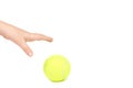 Kid hold tennis ball in hand, isolated on white background. copy space template Royalty Free Stock Photo