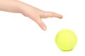 Kid hold tennis ball in hand, isolated on white background Royalty Free Stock Photo