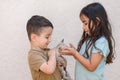 Kid holding baby cat. Little children with a new baby cute kitten. Royalty Free Stock Photo