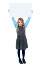 Kid holding blank billboard above her head Royalty Free Stock Photo