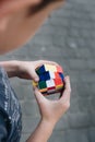 Kid holding rubik cube Royalty Free Stock Photo