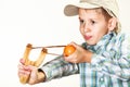 Kid holding slingshot in hands Royalty Free Stock Photo