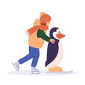 Kid ice skating with skating helper penguin. Child skates training aid. Winter season sport activity for kids. Young girl in Royalty Free Stock Photo