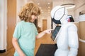 kid interact with cyborg artificial intelligence, communication