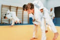 Kid judo, young fighters on training, self-defense Royalty Free Stock Photo