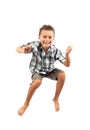 Kid jumping for joy Royalty Free Stock Photo