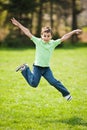 Kid jumping for joy Royalty Free Stock Photo