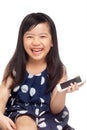 Kid laughing with smartphone in hand