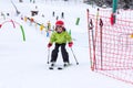 Little boy practicing skiing on ski lesson Royalty Free Stock Photo