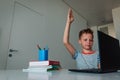 Kid learning remotely. Child having online lesson at home Royalty Free Stock Photo