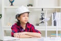 Kid learning about renewable energy, Child girl how wind turbines work Royalty Free Stock Photo