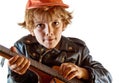 Kid learning to play guitar Royalty Free Stock Photo