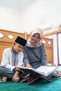 Kid learning to read quran Royalty Free Stock Photo