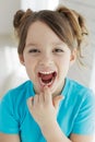 The kid lost a tooth. Baby without a tooth. Portrait of a little girl no tooth. Royalty Free Stock Photo