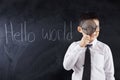 Kid with magnifier and text Hello World