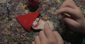 Kid making Santa Claus craftwork