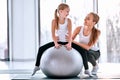 Kid and mother with fitness ball Royalty Free Stock Photo