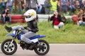 Kid on motorcycle stunt shows