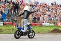 Kid on motorcycle stunt shows