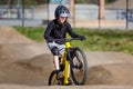 Kid mountain biking Royalty Free Stock Photo