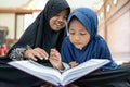 Kid muslim reading quran