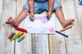 Kid paints with crayons Royalty Free Stock Photo