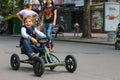 Kid in the play area riding a toy car. Nikolaev, Ukraine