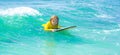 Kid play in summer sea. Summer vacation with child. Kid girl is learning surfing, riding a wave. Little boy swim on kids Royalty Free Stock Photo