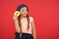 Kid playful girl ready to eat donut. Sweets shop and bakery concept. Kids huge fans of baked donuts. Impossible to Royalty Free Stock Photo