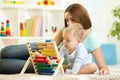 Kid playing with abacus Royalty Free Stock Photo