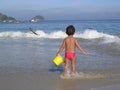 Kid playing in the beach