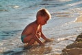 Kid playing on the beach