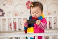 Kid playing cellphone Royalty Free Stock Photo