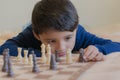 Kid playing chess smart fun Royalty Free Stock Photo