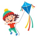 Kid Playing With A Colorful Kite Royalty Free Stock Photo