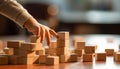 Kid playing with colorful wooden toy blocks. Little boy or girl building tower of block toys. Educational and creative Royalty Free Stock Photo