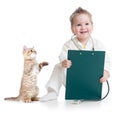 Kid playing doctor with cat Royalty Free Stock Photo