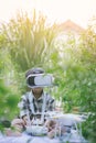 Kid playing drone. Little Pilot Using Drone Remote Controller. Young cute boy holding quadcopter at home. Child playing with drone