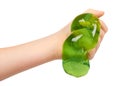 kid playing green slime with hand, transparent toy