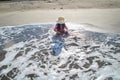 Kid playing sand in Nato Beach in the Philippines Royalty Free Stock Photo