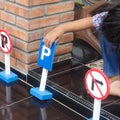 Kid playing with traffic signs toys, educational games for preschool children