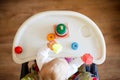 The kid plays the pyramid. child playing with toys view from above Royalty Free Stock Photo