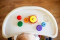 The kid plays the pyramid. child in the children`s room playing with toys Royalty Free Stock Photo