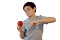 Kid pointing an Apple Royalty Free Stock Photo