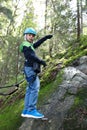 Kid posing with climbing equipment in park Royalty Free Stock Photo