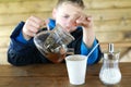 Kid pouring herbal tea