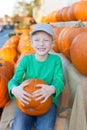 Kid at pumpkin patch Royalty Free Stock Photo