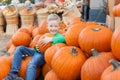 Kid at pumpkin patch Royalty Free Stock Photo