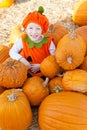 Kid at pumpkin patch Royalty Free Stock Photo