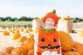 Kid at pumpkin patch Royalty Free Stock Photo